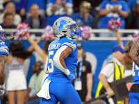 DETROIT,MICHIGAN-NOVEMBER17: Running back David Montgomery (5) of the Detroit Lions runs off the field after making the first touchdown of...