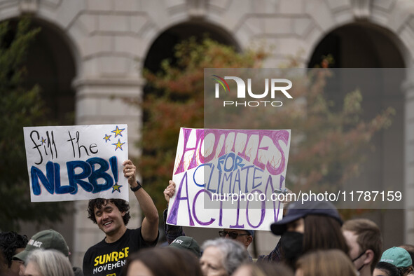 Environmental activists rally to demand climate action before US President-elect Donald Trump takes office in Washington, DC, on November 17...