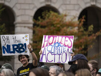 Environmental activists rally to demand climate action before US President-elect Donald Trump takes office in Washington, DC, on November 17...