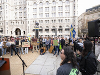 Environmental activists rally to demand climate action before US President-elect Donald Trump takes office in Washington, DC, on November 17...