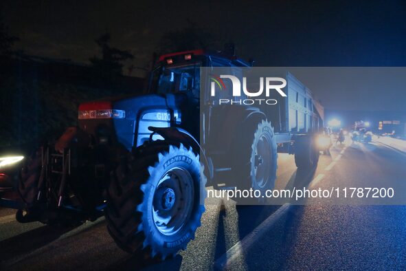 French farmers drive their tractors on the RN118 road at the start of a nationwide protest against the EU-Mercosur agreement, with farmers f...