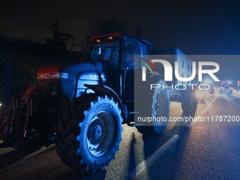 French farmers drive their tractors on the RN118 road at the start of a nationwide protest against the EU-Mercosur agreement, with farmers f...