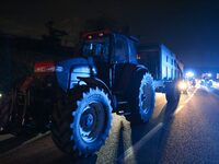 French farmers drive their tractors on the RN118 road at the start of a nationwide protest against the EU-Mercosur agreement, with farmers f...