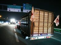 French farmers drive their tractors on the RN118 road at the start of a nationwide protest against the EU-Mercosur agreement, with farmers f...