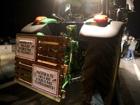 French farmers drive their tractors on the RN118 road at the start of a nationwide protest against the EU-Mercosur agreement, with farmers f...