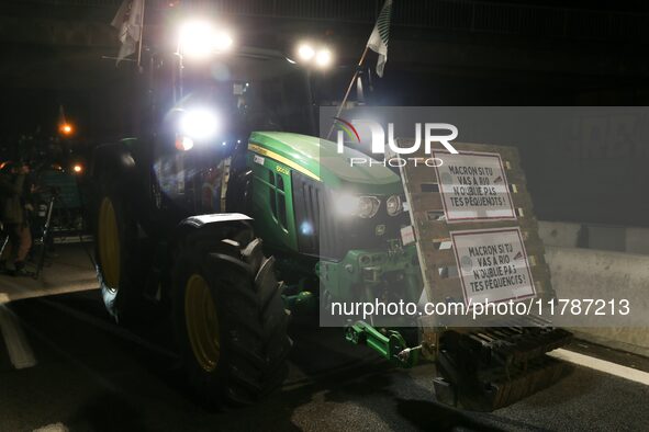 French farmers drive their tractors on the RN118 road at the start of a nationwide protest against the EU-Mercosur agreement, with farmers f...