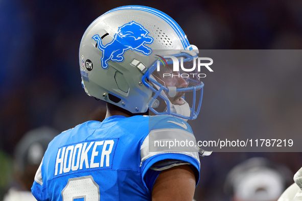 DETROIT,MICHIGAN-NOVEMBER17:  Quarterback Hendon Hooker (2) of the Detroit Lions looks on from the sidelines during a game between the Detro...