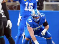 DETROIT,MICHIGAN-NOVEMBER17:  Quarterback Jared Goff (16) of the Detroit Lions calls a play as center Frank Ragnow (77) of the Detroit Lions...