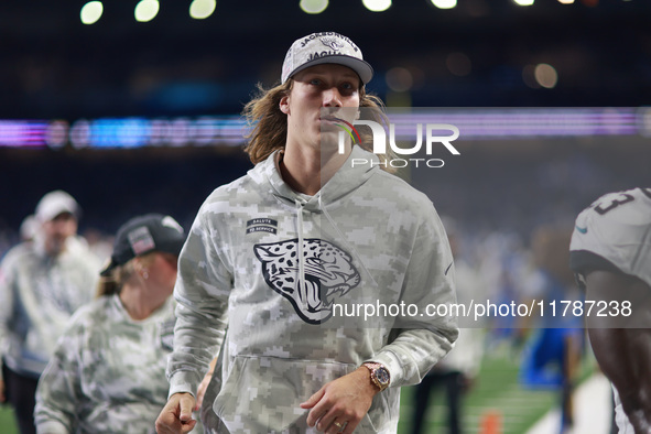 DETROIT,MICHIGAN-November 17: Jacksonville Jaguars quarterback Trevor Lawrence (16) walks off the field after an NFL football game between t...