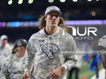 DETROIT,MICHIGAN-November 17: Jacksonville Jaguars quarterback Trevor Lawrence (16) walks off the field after an NFL football game between t...