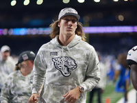 DETROIT,MICHIGAN-November 17: Jacksonville Jaguars quarterback Trevor Lawrence (16) walks off the field after an NFL football game between t...