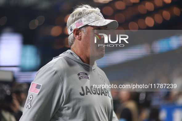 DETROIT,MICHIGAN-November 17: Jacksonville Jaguars head coach Doug Pederson walks off the field after an NFL football game between the Jacks...