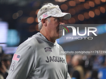 DETROIT,MICHIGAN-November 17: Jacksonville Jaguars head coach Doug Pederson walks off the field after an NFL football game between the Jacks...