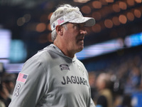 DETROIT,MICHIGAN-November 17: Jacksonville Jaguars head coach Doug Pederson walks off the field after an NFL football game between the Jacks...