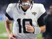 DETROIT,MICHIGAN-November 17: Jacksonville Jaguars quarterback Mac Jones (10) walks off the field after an NFL football game between the Jac...