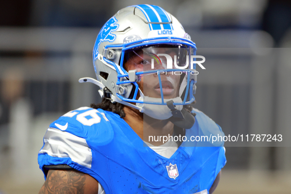 DETROIT,MICHIGAN-NOVEMBER17: running back Jahmyr Gibbs (26) of the Detroit Lions runs on the field after a play  during a game between the D...