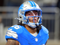 DETROIT,MICHIGAN-NOVEMBER17: running back Jahmyr Gibbs (26) of the Detroit Lions runs on the field after a play  during a game between the D...