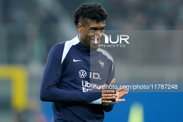 Kingsley Coman of France smiles during the UEFA Nations League 2024/25 League A Group 2 match between Italy and France at Stadio Giuseppe Me...