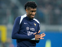 Kingsley Coman of France smiles during the UEFA Nations League 2024/25 League A Group 2 match between Italy and France at Stadio Giuseppe Me...