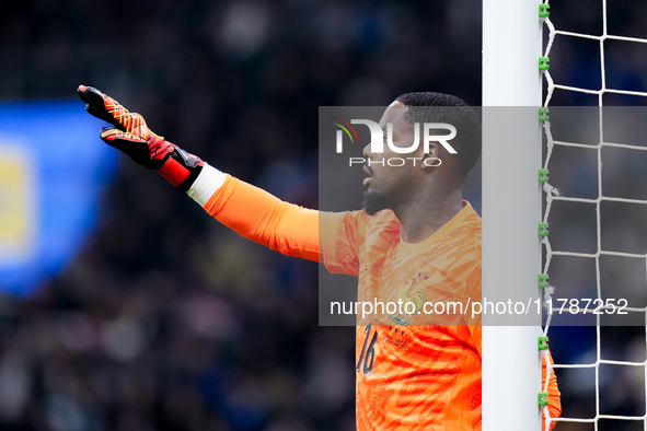 Mike Maignan of France gestures during the UEFA Nations League 2024/25 League A Group 2 match between Italy and France at Stadio Giuseppe Me...