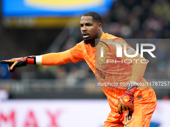 Mike Maignan of France gestures during the UEFA Nations League 2024/25 League A Group 2 match between Italy and France at Stadio Giuseppe Me...