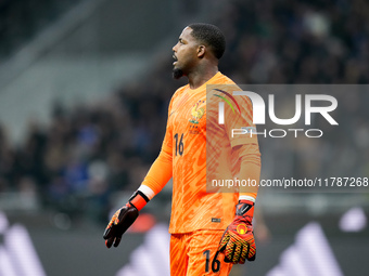 Mike Maignan of France gestures during the UEFA Nations League 2024/25 League A Group 2 match between Italy and France at Stadio Giuseppe Me...