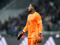 Mike Maignan of France gestures during the UEFA Nations League 2024/25 League A Group 2 match between Italy and France at Stadio Giuseppe Me...