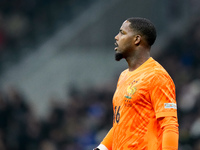 Mike Maignan of France looks on during the UEFA Nations League 2024/25 League A Group 2 match between Italy and France at Stadio Giuseppe Me...