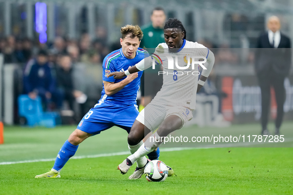 Nicolo' Barella of Italy and Manu Kone' of France compete for the ball 1during the UEFA Nations League 2024/25 League A Group 2 match betwee...