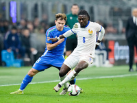 Nicolo' Barella of Italy and Manu Kone' of France compete for the ball 1during the UEFA Nations League 2024/25 League A Group 2 match betwee...