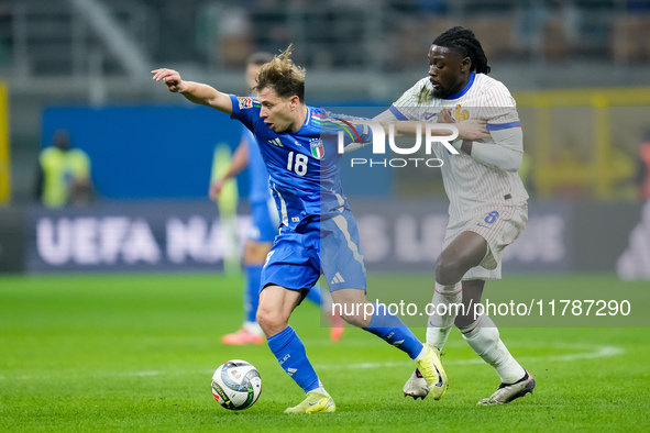 Manu Kone' of France and Nicolo' Barella of Italy compete for the ball during the UEFA Nations League 2024/25 League A Group 2 match between...