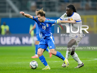 Manu Kone' of France and Nicolo' Barella of Italy compete for the ball during the UEFA Nations League 2024/25 League A Group 2 match between...