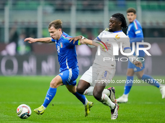 Manu Kone' of France and Nicolo' Barella of Italy compete for the ball during the UEFA Nations League 2024/25 League A Group 2 match between...