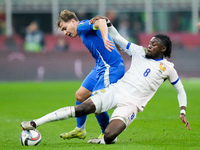 Manu Kone' of France and Nicolo' Barella of Italy compete for the ball during the UEFA Nations League 2024/25 League A Group 2 match between...