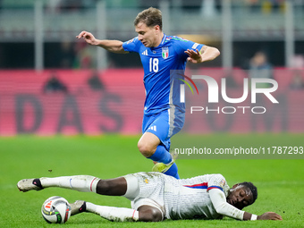 Manu Kone' of France and Nicolo' Barella of Italy compete for the ball during the UEFA Nations League 2024/25 League A Group 2 match between...