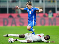 Manu Kone' of France and Nicolo' Barella of Italy compete for the ball during the UEFA Nations League 2024/25 League A Group 2 match between...