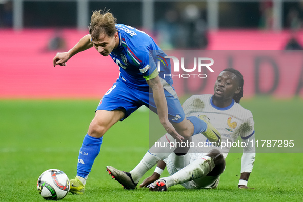 Manu Kone' of France and Nicolo' Barella of Italy compete for the ball during the UEFA Nations League 2024/25 League A Group 2 match between...