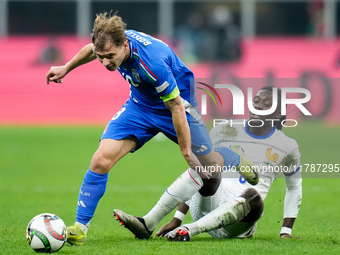 Manu Kone' of France and Nicolo' Barella of Italy compete for the ball during the UEFA Nations League 2024/25 League A Group 2 match between...