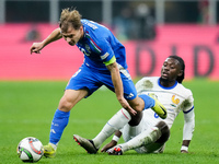 Manu Kone' of France and Nicolo' Barella of Italy compete for the ball during the UEFA Nations League 2024/25 League A Group 2 match between...