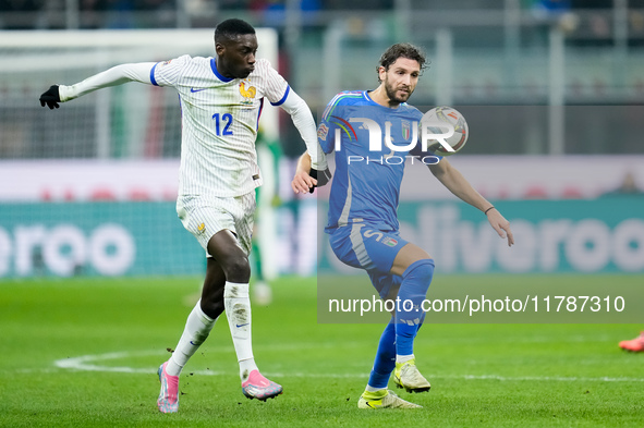 Randal Kolo Muani of France and Manuel Locatelli of Italy compete for the ball during the UEFA Nations League 2024/25 League A Group 2 match...