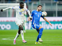 Randal Kolo Muani of France and Manuel Locatelli of Italy compete for the ball during the UEFA Nations League 2024/25 League A Group 2 match...