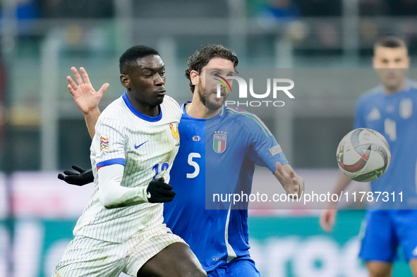 Randal Kolo Muani of France and Manuel Locatelli of Italy compete for the ball during the UEFA Nations League 2024/25 League A Group 2 match...