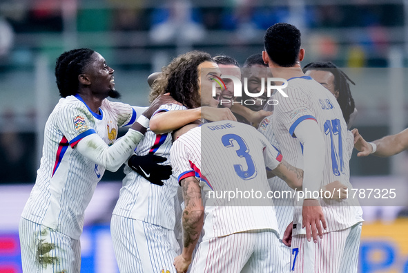 Lucas Digne of France celebrates after scoring second goal during the UEFA Nations League 2024/25 League A Group 2 match between Italy and F...