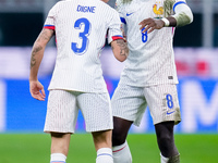 Lucas Digne of France celebrates after scoring second goal during the UEFA Nations League 2024/25 League A Group 2 match between Italy and F...