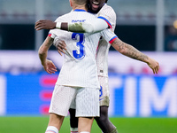 Lucas Digne of France celebrates after scoring second goal during the UEFA Nations League 2024/25 League A Group 2 match between Italy and F...