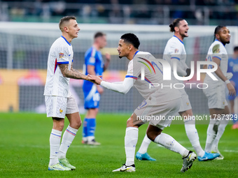 Lucas Digne of France celebrates after scoring second goal during the UEFA Nations League 2024/25 League A Group 2 match between Italy and F...