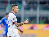 Lucas Digne of France celebrates after scoring second goal during the UEFA Nations League 2024/25 League A Group 2 match between Italy and F...