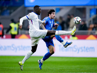 Marcus Thuram of France and Sandro Tonali of Italy compete for the ball during the UEFA Nations League 2024/25 League A Group 2 match betwee...