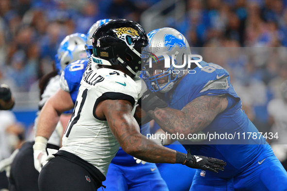 DETROIT,MICHIGAN-November 17: Detroit Lions offensive tackle Taylor Decker (68) defends against Jacksonville Jaguars defensive end Josh Hine...