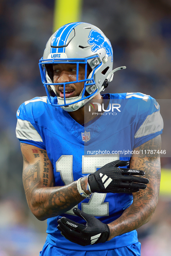 DETROIT,MICHIGAN-NOVEMBER17:  Wide receiver Tim Patrick (17) of the Detroit Lions communicates with a coach between plays during a game betw...